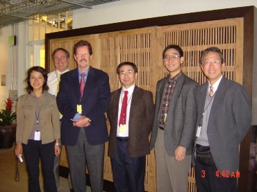 Group photo with lab professor at conference