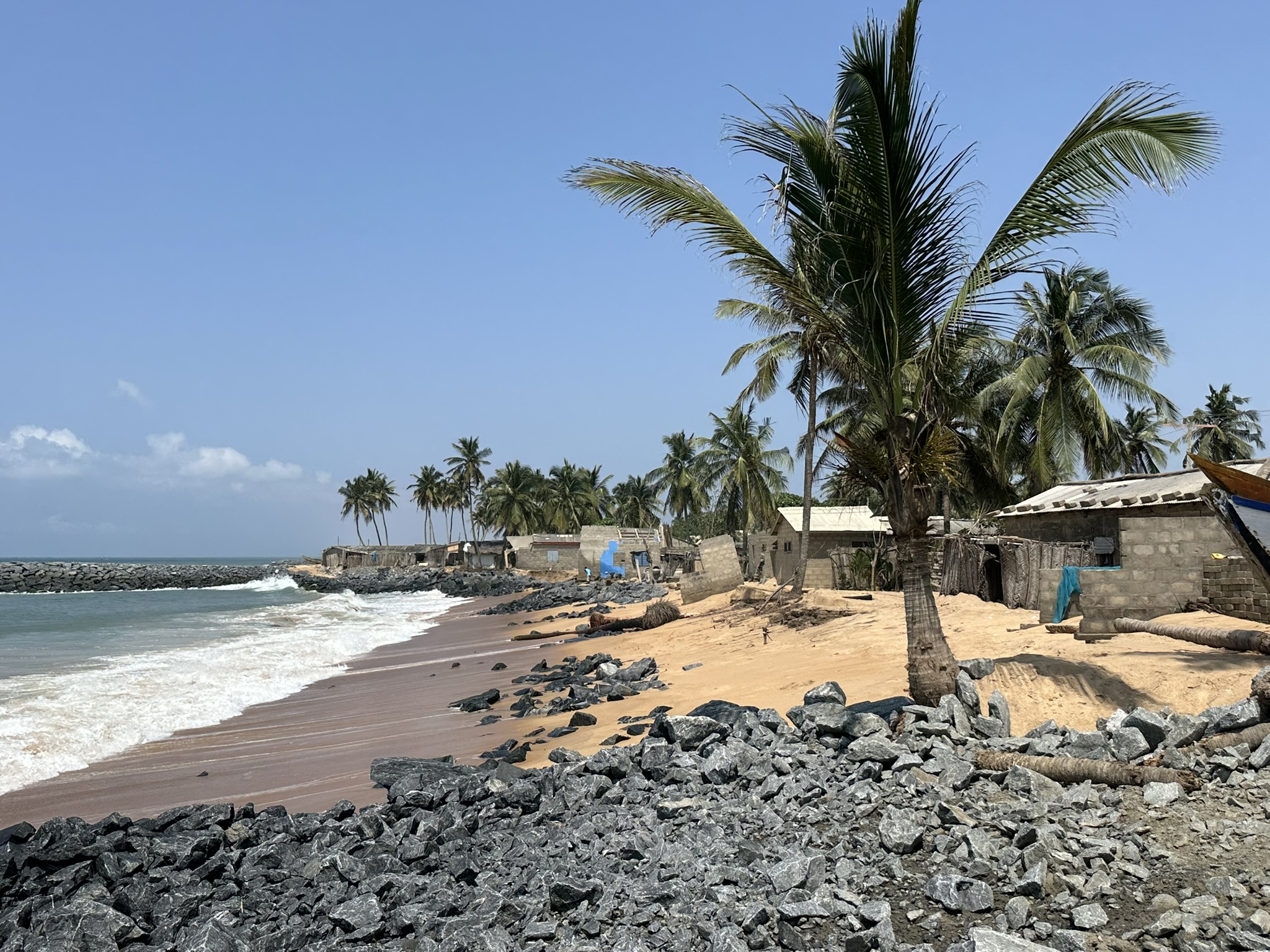Coastal village and revetment along the Ghanaian coast